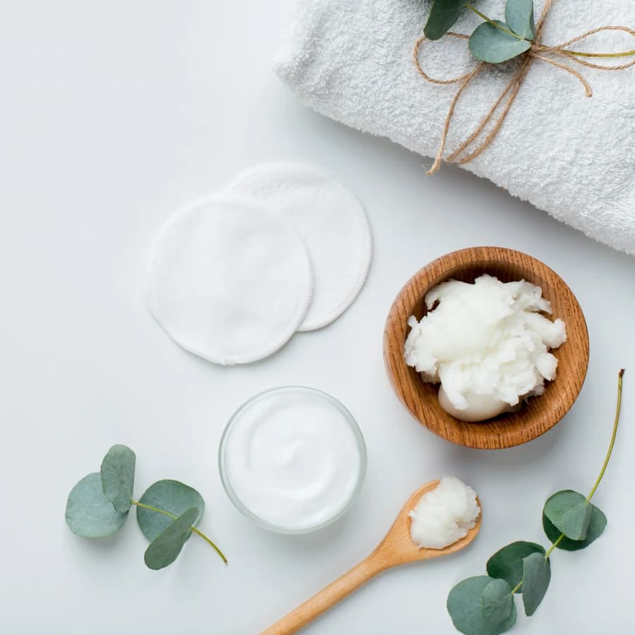 Spa massage tools — towel, eucalyptus, and natural balms